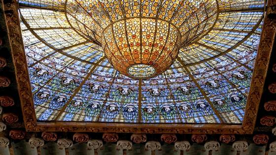 The stained-glass skylight of the Palau seen from below