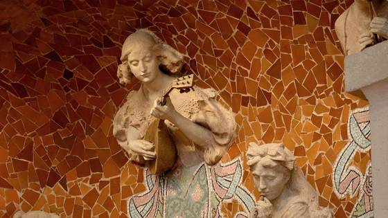 A muse playing a mandolin, at an angle